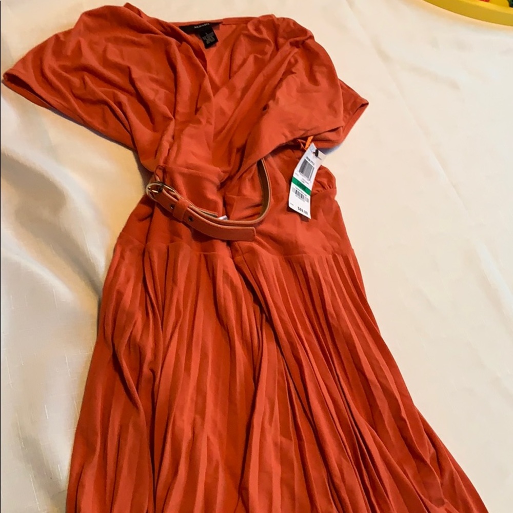 Orange belted pleated skirt dress